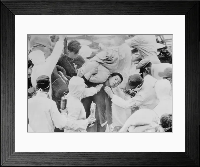 Framed Print : Medics Helping Refugees Framed Print : Medics Helping Refugees