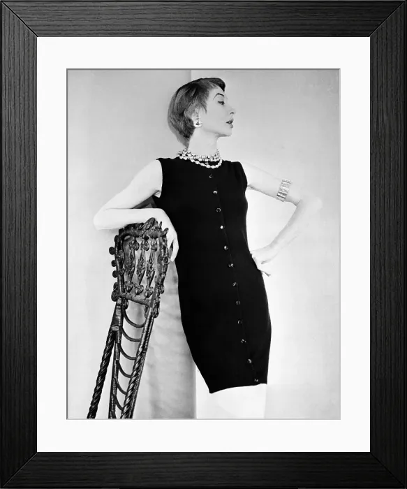 Framed Print : Female Model Posing Against Chair