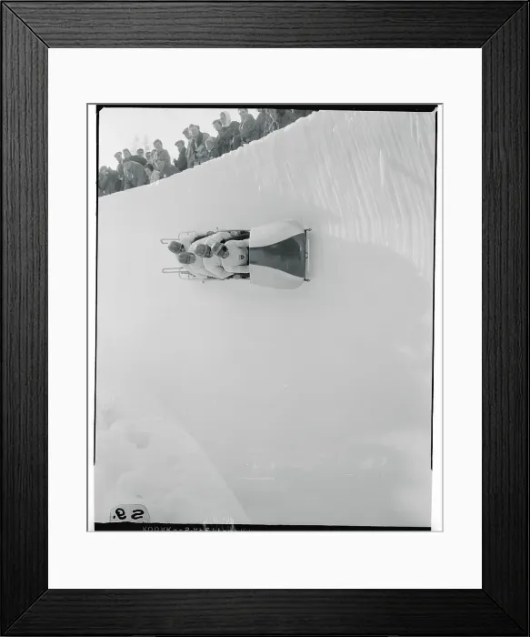 Framed Print : Bobsled Team Racing Down the Course Framed Print : Bobsled Team Racing Down the Course