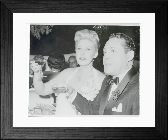 Framed Print : Serge Rubinstein and Betty Reed Making to a Toast Framed Print : Serge Rubinstein and Betty Reed Making to a Toast