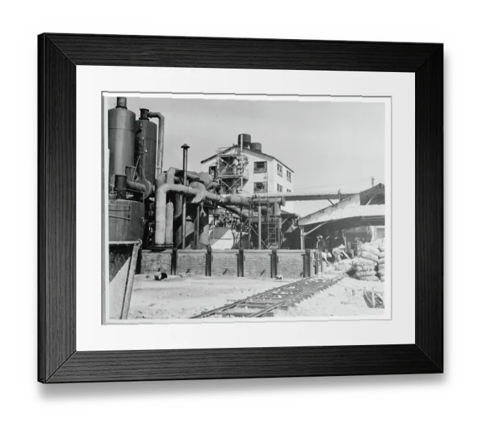 Framed Print : Men Working Near Transporting Railway at Plant Framed Print : Men Working Near Transporting Railway at Plant