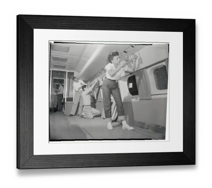 Framed Print : Dorothy Moreno Working on Interior of Plane Framed Print : Dorothy Moreno Working on Interior of Plane
