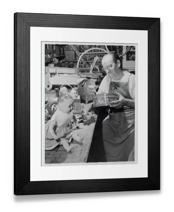 Framed Print : Elliott Hayden Repairing Toys Framed Print : Elliott Hayden Repairing Toys