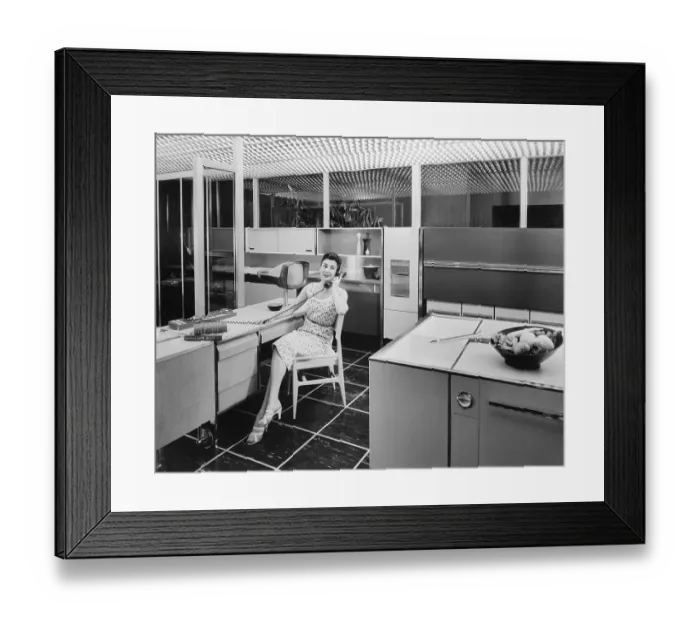 Framed Print : Woman Sitting in Kitchen Framed Print : Woman Sitting in Kitchen