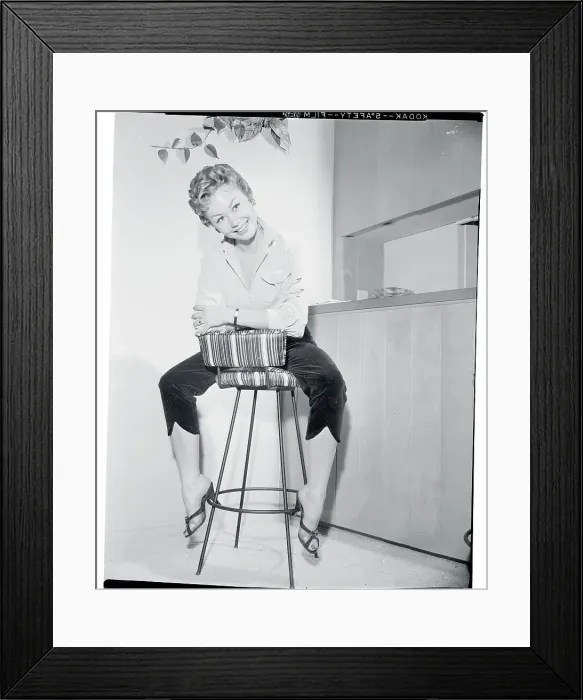 Framed Print : Actress Mitzi Gaynor Posing on Stool Framed Print : Actress Mitzi Gaynor Posing on Stool