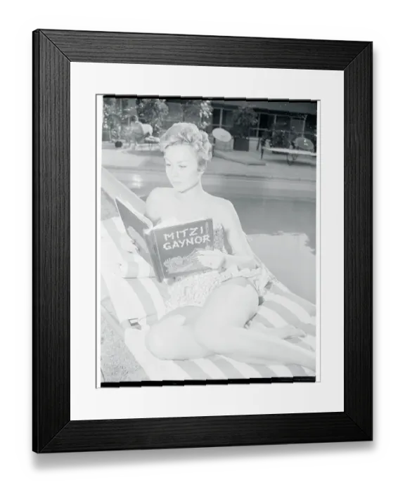 Framed Print : Mitzi Gaynor Reading Script at Poolside Framed Print : Mitzi Gaynor Reading Script at Poolside