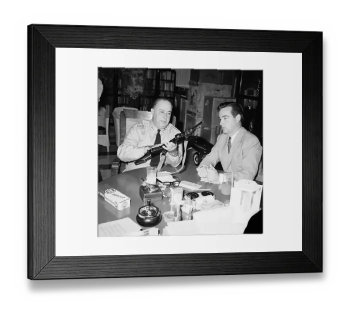 Framed Print : Anastasio Somoza with Gun and Reporter Framed Print : Anastasio Somoza with Gun and Reporter