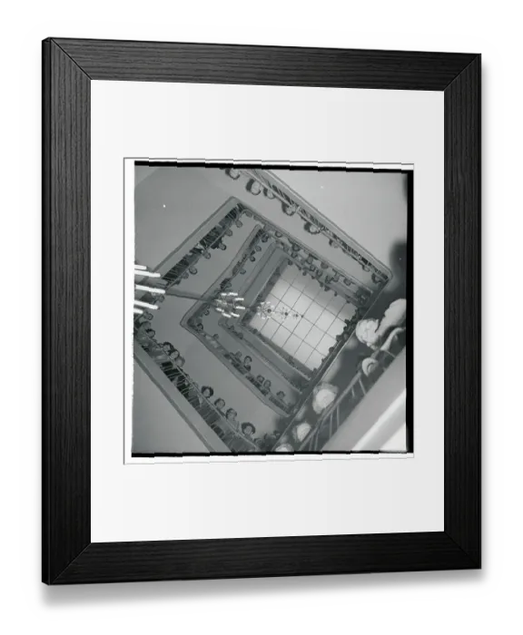 Framed Print : View of People Peering Down Open Stairwell Framed Print : View of People Peering Down Open Stairwell