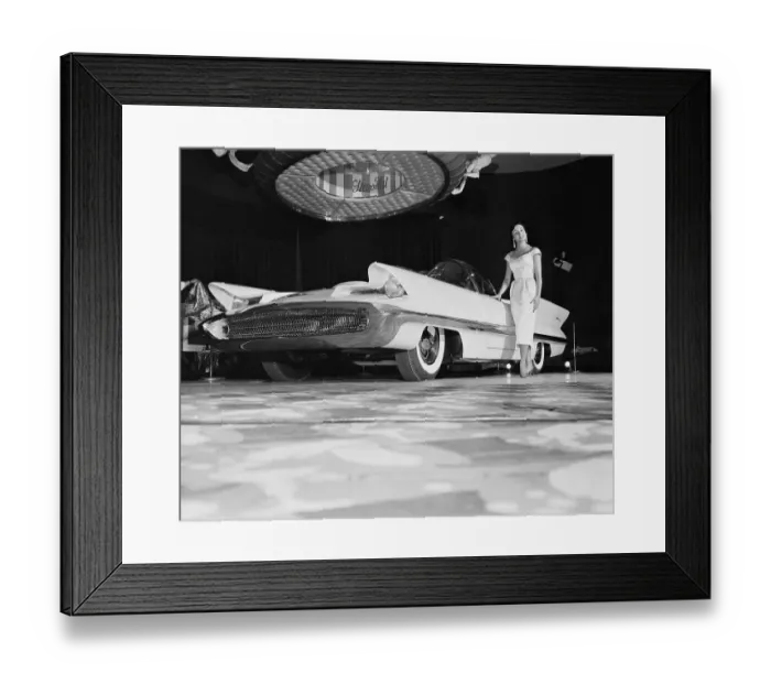 Framed Print : Model Standing Next to the New Futura Automobile Framed Print : Model Standing Next to the New Futura Automobile