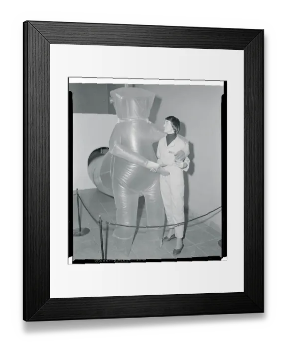 Framed Print : Person Wearing a Plastic Protective Outfit