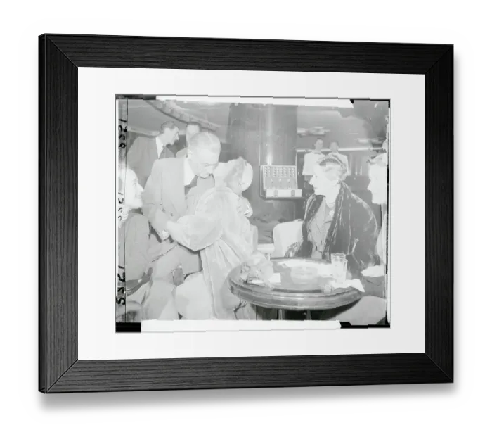 Framed Print : Marlene Dietrich Giving Kiss to Henri Bonnet Framed Print : Marlene Dietrich Giving Kiss to Henri Bonnet