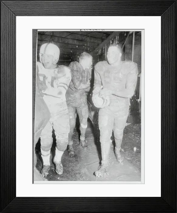 Framed Print : Football Players Covered in Mud Framed Print : Football Players Covered in Mud