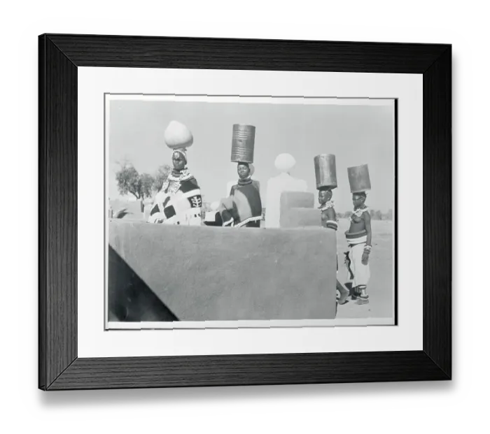 Framed Print : People Carrying Water Containers Framed Print : People Carrying Water Containers