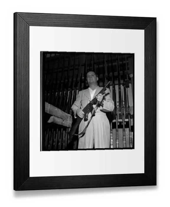 Framed Print : Jose Antonio Remon Carries a Machine Gun Framed Print : Jose Antonio Remon Carries a Machine Gun