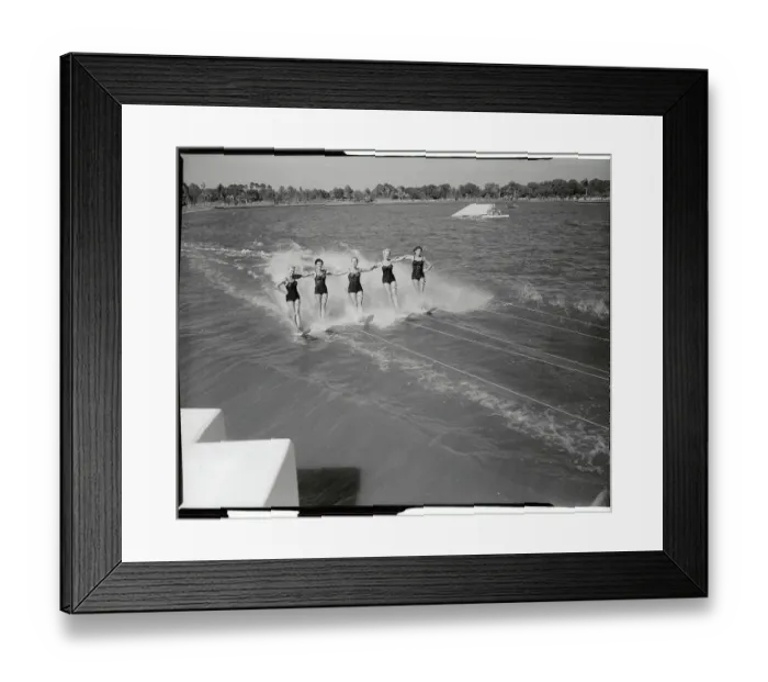 Framed Print : Skilled Female Water Skiers Performing on the Water Framed Print : Skilled Female Water Skiers Performing on the Water