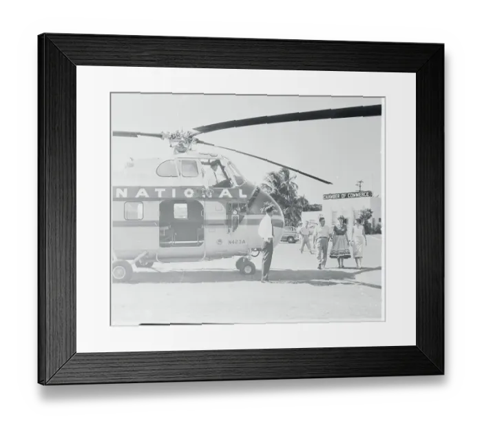 Framed Print : Passengers Preparing to Board Helicopter Framed Print : Passengers Preparing to Board Helicopter