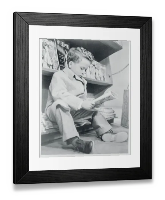 Framed Print : Rusty Hamer Reading Magazine