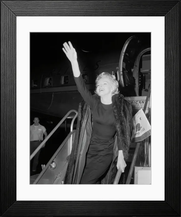 Framed Print : Marilyn Monroe Walking Leaving Airplane and Waving Framed Print : Marilyn Monroe Walking Leaving Airplane and Waving