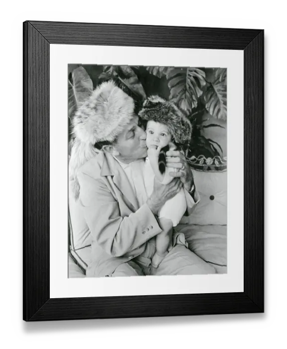 Framed Print : Walt Disney Holding His Grandson and Kissing His Cheek Framed Print : Walt Disney Holding His Grandson and Kissing His Cheek