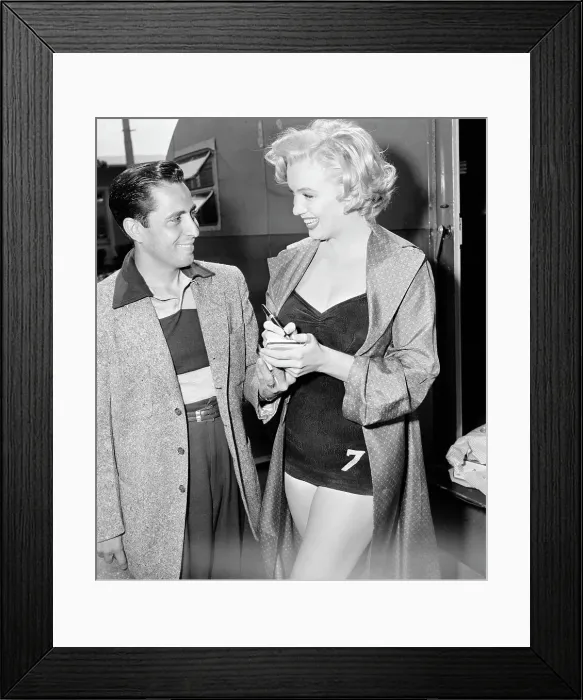 Framed Print : Marilyn Monroe Standing by Young Man Framed Print : Marilyn Monroe Standing by Young Man