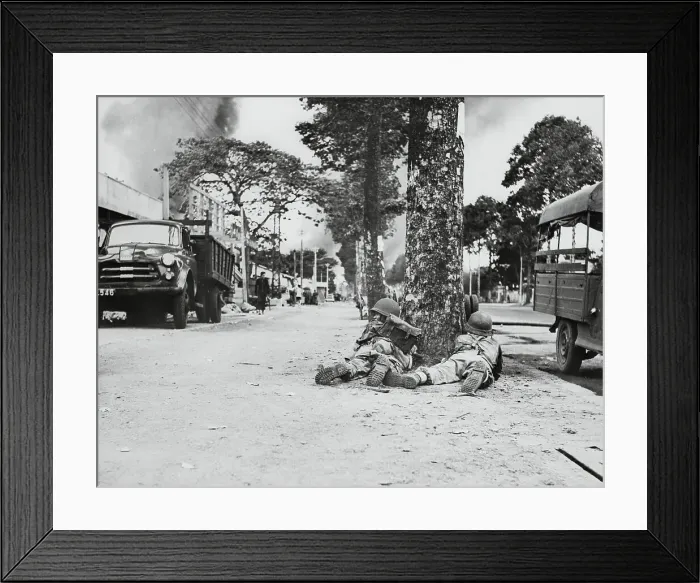Framed Print : Soldiers Firing Weapons from Behind a Tree Framed Print : Soldiers Firing Weapons from Behind a Tree