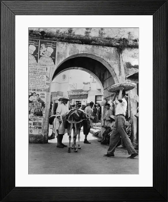 Framed Print : Street Merchants Standing Under Arch with Spanish Posters Framed Print : Street Merchants Standing Under Arch with Spanish Posters