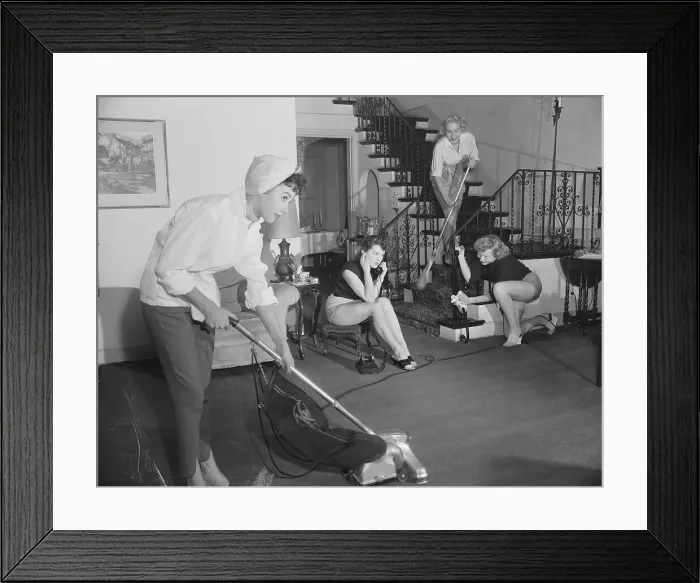 Framed Print : Young Women Cleaning a Room Framed Print : Young Women Cleaning a Room