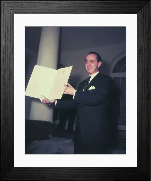Framed Print : Jonas Salk Holding Presidential Citation Framed Print : Jonas Salk Holding Presidential Citation