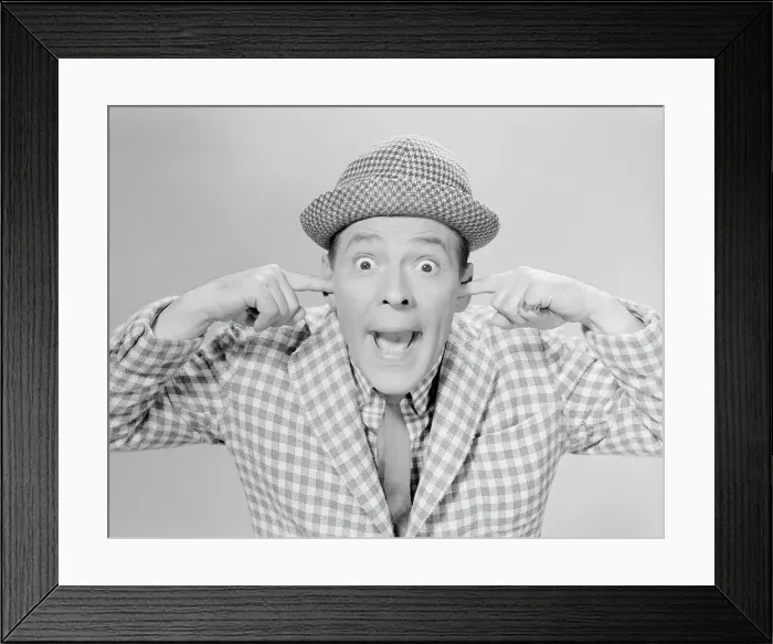 Framed Print : Pinky Lee. Comedian Pinky Lee in his trademark checked suits and his fingers in his ears Framed Print : Pinky Lee. Comedian Pinky Lee in his trademark checked suits and his fingers in his ears