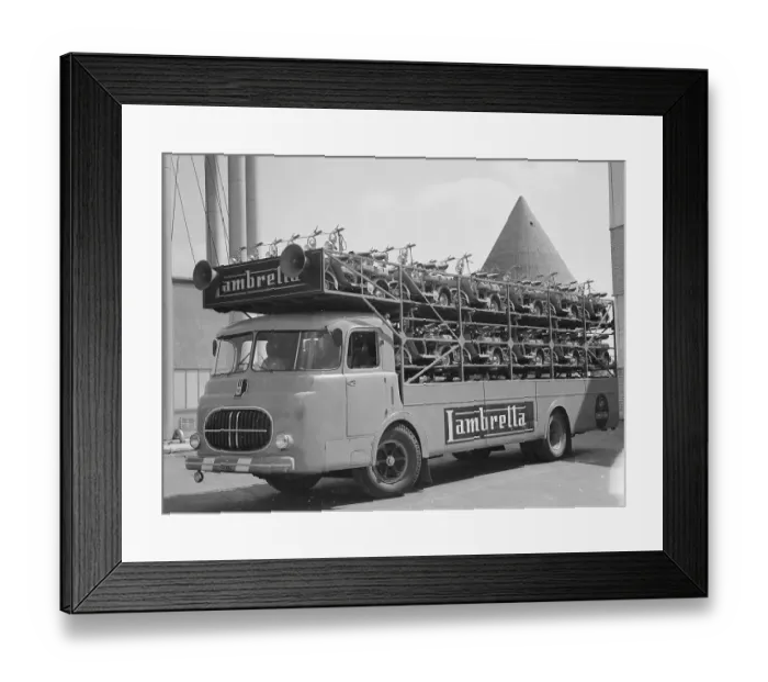 Framed Print : Large Truck Hauling Motor Bikes Framed Print : Large Truck Hauling Motor Bikes