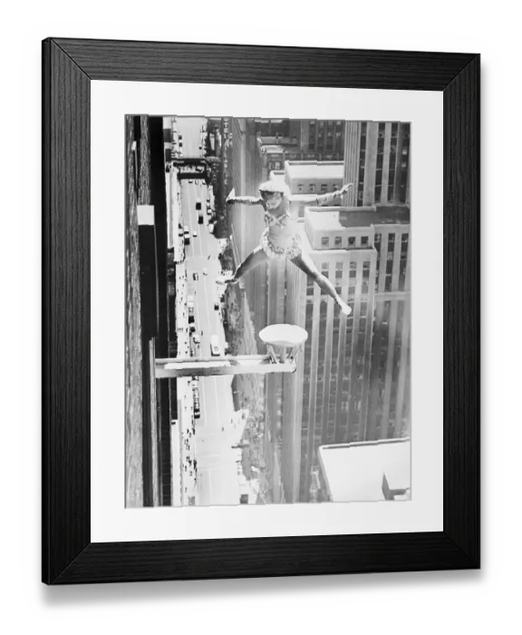Framed Print : Woman Doing Stunts On Building