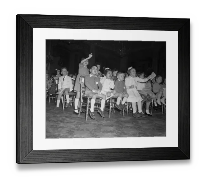 Framed Print : Children Watching a Puppet Show Framed Print : Children Watching a Puppet Show