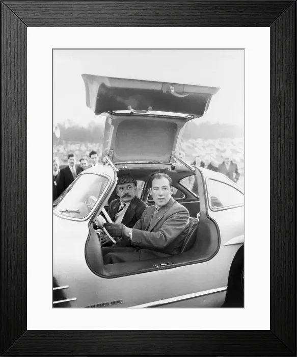 Framed Print : Stirling Moss at the Wheel Framed Print : Stirling Moss at the Wheel