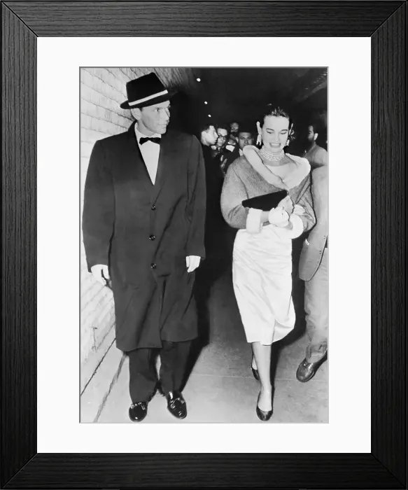 Framed Print : Gloria Vanderbilt and Frank Sinatra Walking Together Framed Print : Gloria Vanderbilt and Frank Sinatra Walking Together