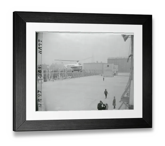 Framed Print : Helicopter Landing on a Pier Framed Print : Helicopter Landing on a Pier