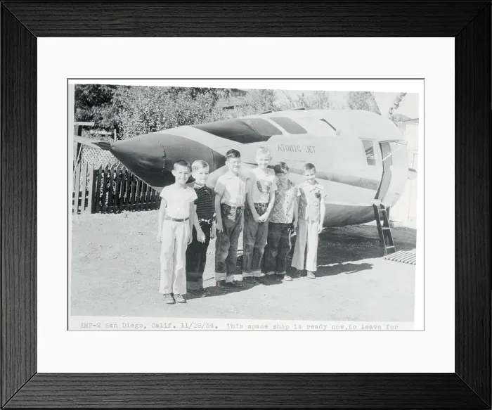 Framed Print : Children Standing Next to Their Rocket Ship Framed Print : Children Standing Next to Their Rocket Ship