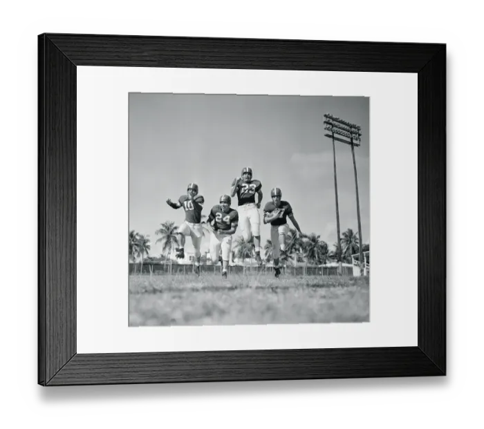 Framed Print : Football Players Running Framed Print : Football Players Running