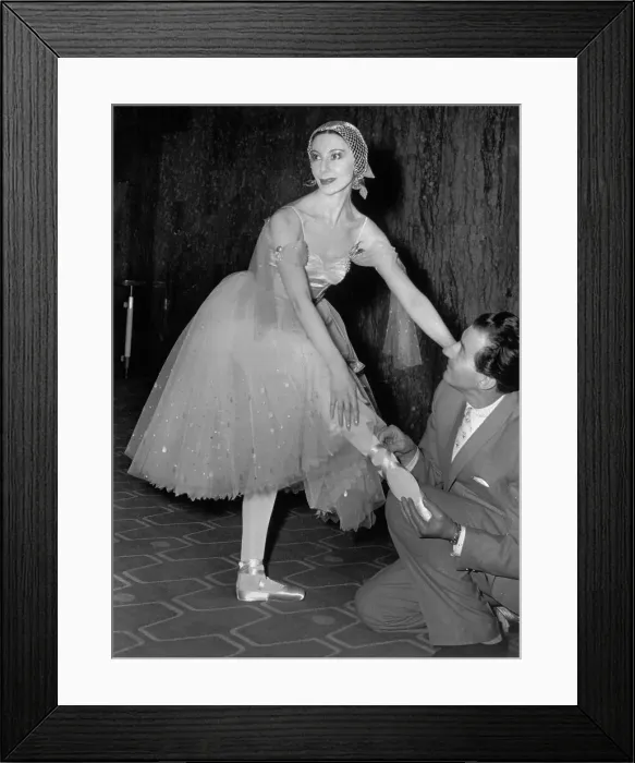 Framed Print : Alicia Markova Allowing Her Co Star to Adjust Shoes for Dance