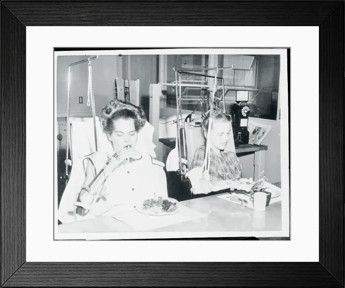Framed Print : Two Patients Eating Their Food with the Help of Specialized Equipment Framed Print : Two Patients Eating Their Food with the Help of Specialized Equipment