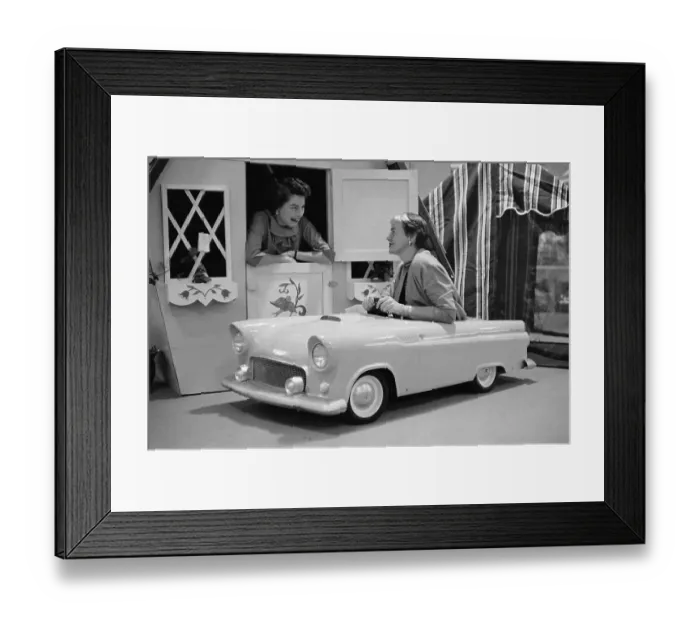 Framed Print : Joan Voorhees Driving a Toy Car Framed Print : Joan Voorhees Driving a Toy Car