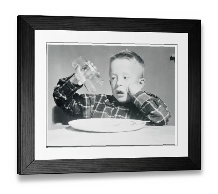 Framed Print : Boy Holding an Empty Glass Framed Print : Boy Holding an Empty Glass