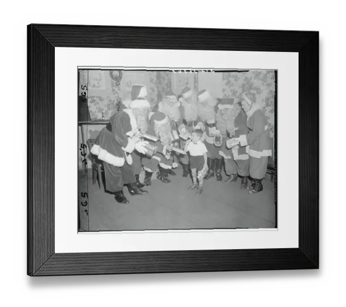 Framed Print : Santa Clauses Offering Presents to Anthony Ventura Framed Print : Santa Clauses Offering Presents to Anthony Ventura