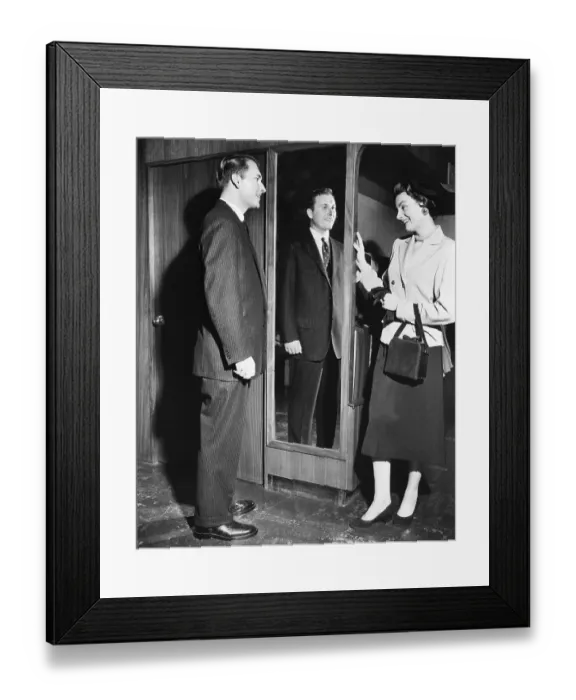 Framed Print : Man in Tailored Suit with Woman by Mirror Framed Print : Man in Tailored Suit with Woman by Mirror