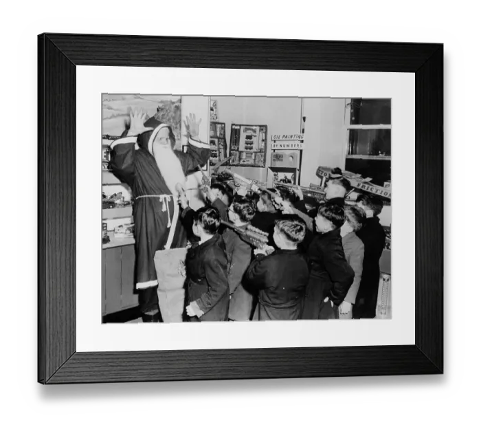 Framed Print : Boys Holding up Santa Claus with Toy Guns