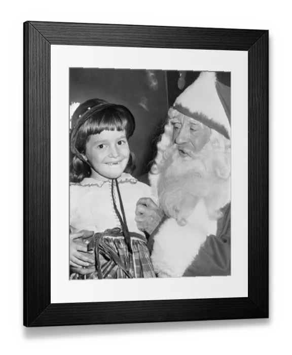 Framed Print : Girl Talking to Santa Claus Framed Print : Girl Talking to Santa Claus