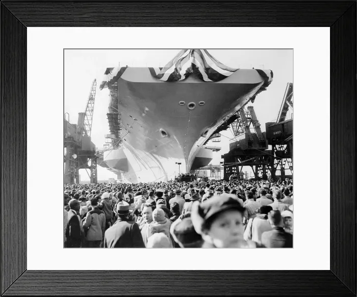 Framed Print : View of Citizens Dwarfed by Giant Military Carrier Framed Print : View of Citizens Dwarfed by Giant Military Carrier