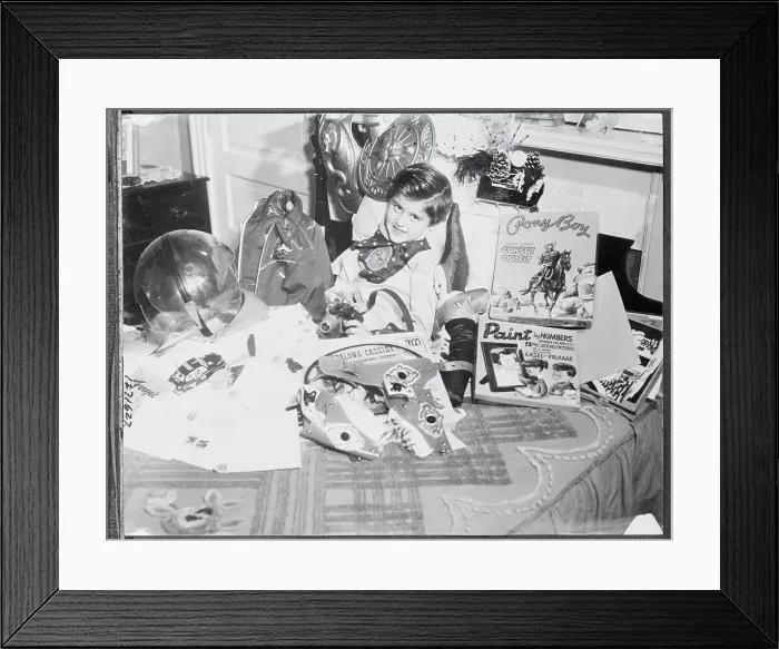 Framed Print : Billy Bente Sitting Surrounded by Toys Framed Print : Billy Bente Sitting Surrounded by Toys