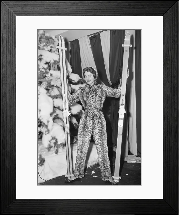 Framed Print : Woman Holding Skis Framed Print : Woman Holding Skis