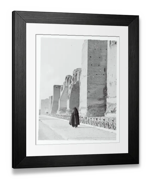 Framed Print : Nun Passing the Roman Wall Framed Print : Nun Passing the Roman Wall