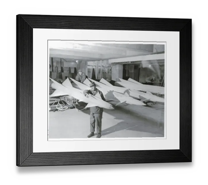 Framed Print : Military Man Working on Horizontal Missile Framed Print : Military Man Working on Horizontal Missile